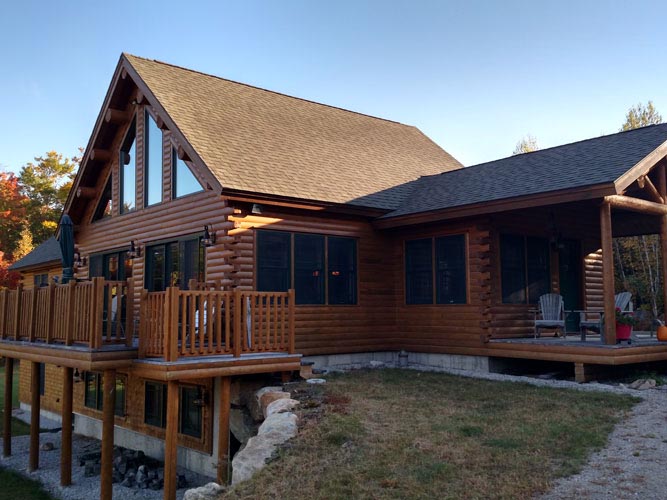 Madison Log Home Exterior with daylight basement