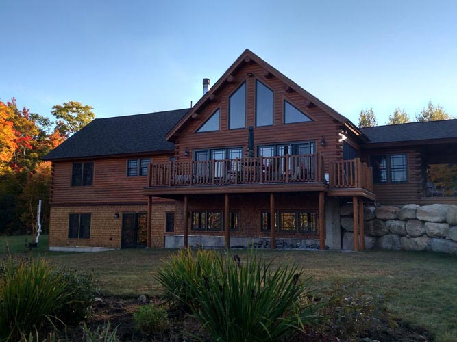 Madison Log Home Exterior Gable with lots of glass