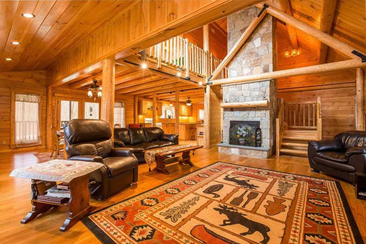 Log home great room with fireplace