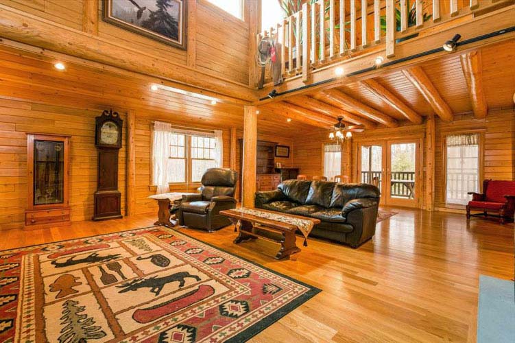 Coopersburg Log Home Great Room with leather furniture