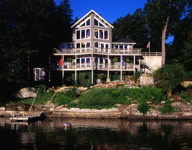 Sandy Hook log home lake exterior