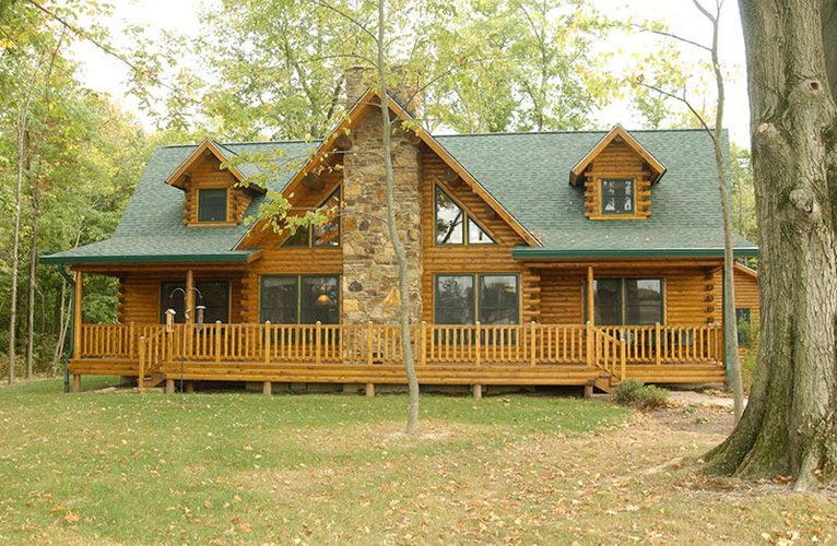 Indy log home exterior with deck