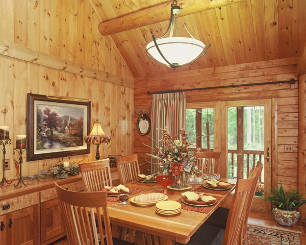 Indy log home dining room with chandelier 