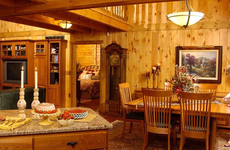 Indy log home kitchen facing toward great room