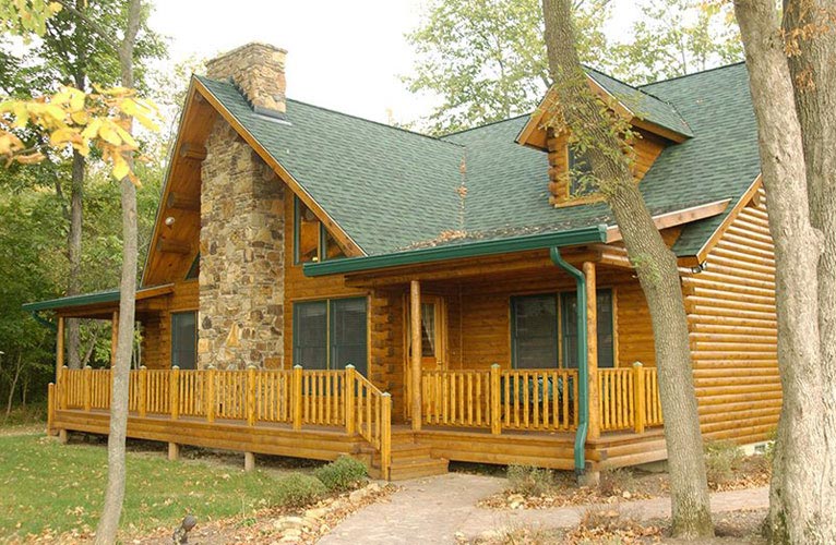 Indy log home exterior with deck space for entertaining 