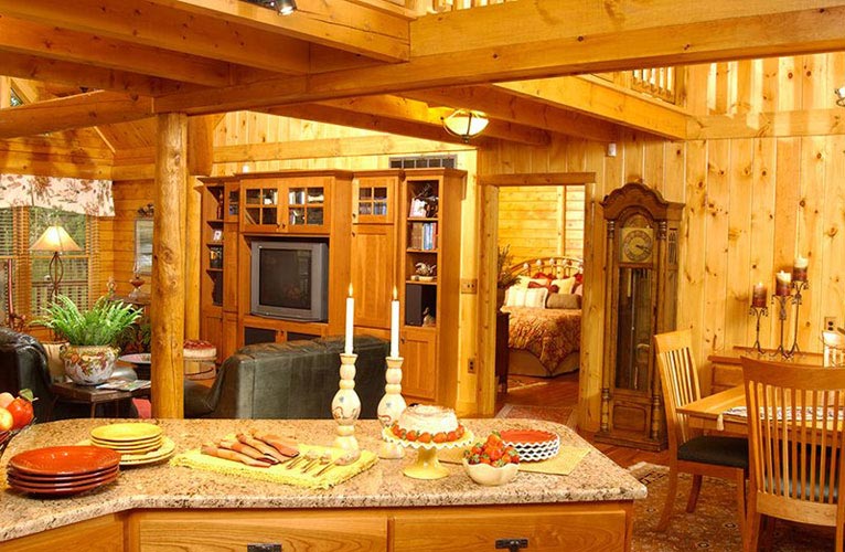 Kitchen of log home with granite counter top