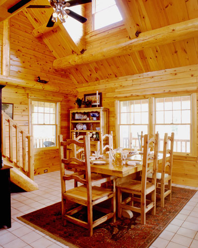 Dining room in log home with cathedral ceilings