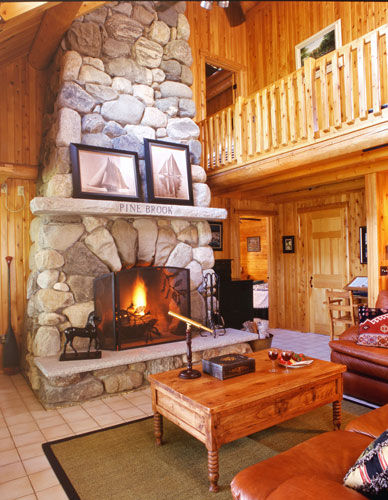 Stone fireplace in log home Great Room