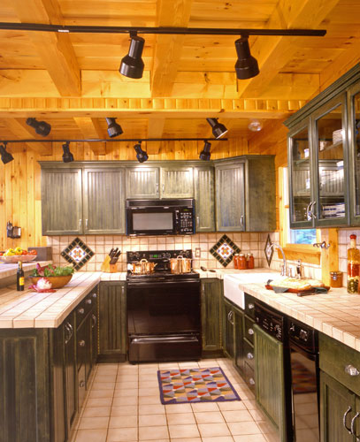 Log home kitchen with track lighting 