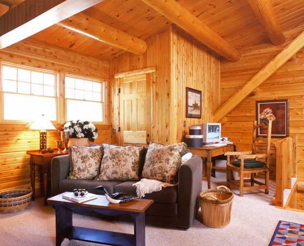 Sitting area in loft with leather couch