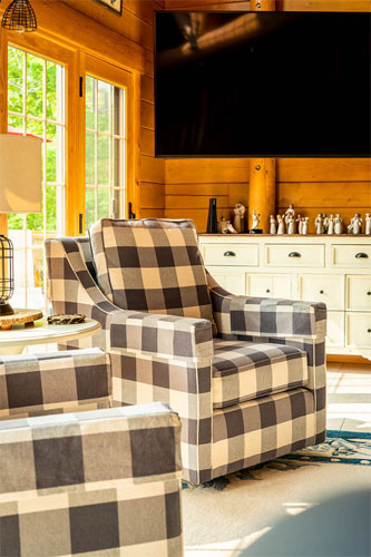 Two chairs in the Great Room of a log home