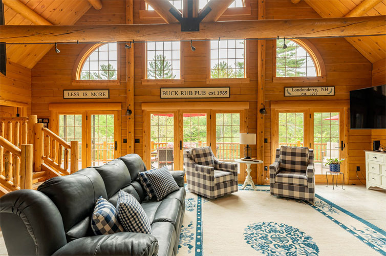 Great Room with large windows in a log home