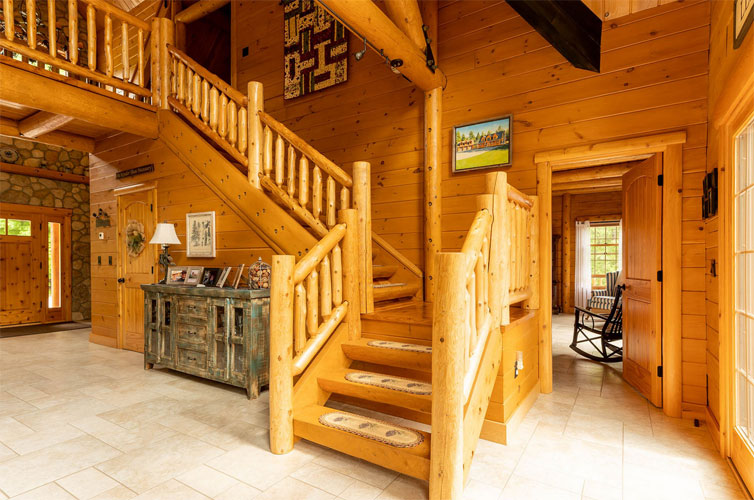 Log stairs leading up to loft