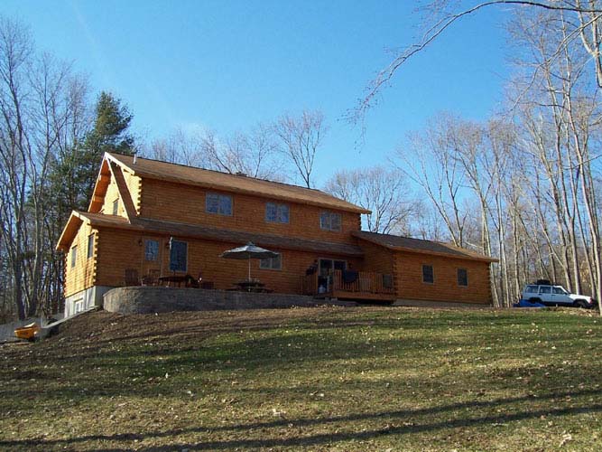 Coopersburg log home exterior of back with dormer