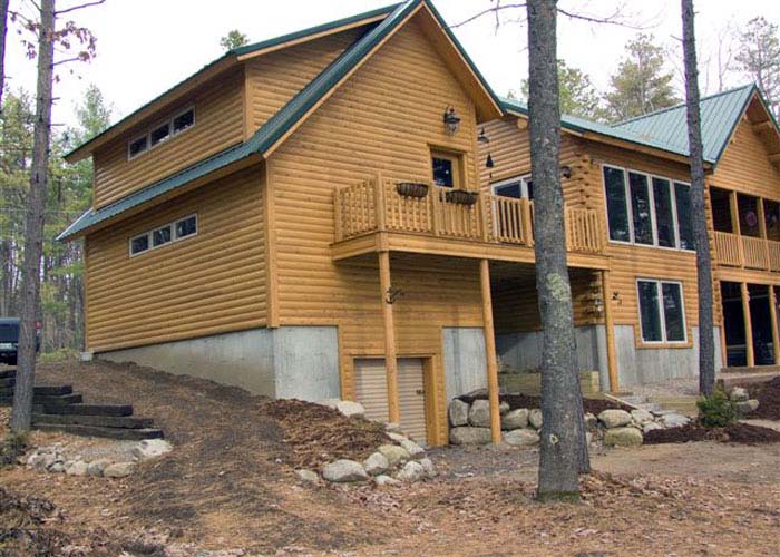 Log home balacony with daylight basement