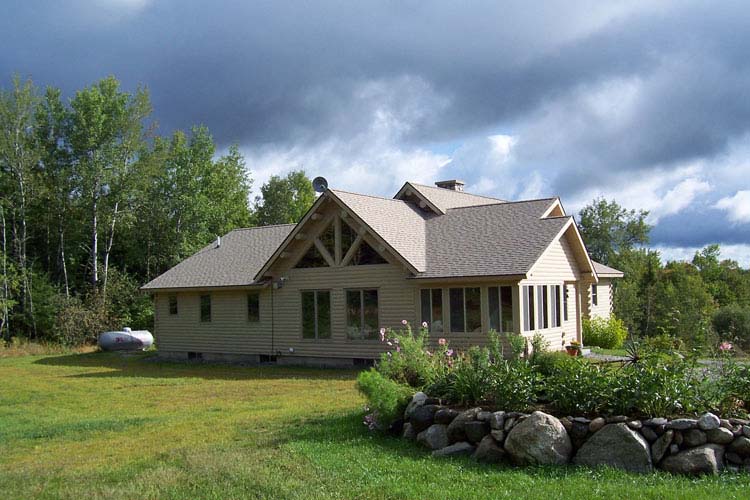 Log home exterior stained gray