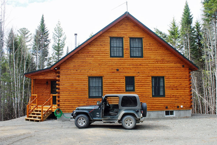 Log cabin set in the woods