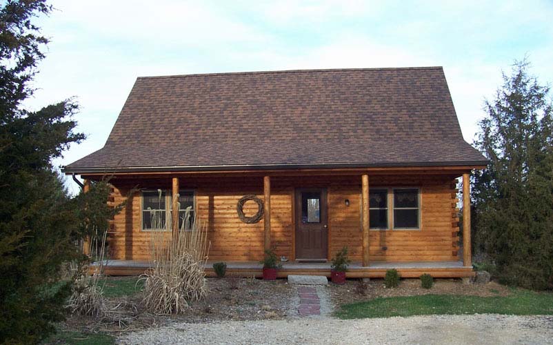 Musquash log cabin with front porch