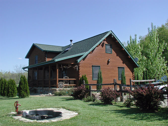 Vancouver Log Home Exterior with fountain pond