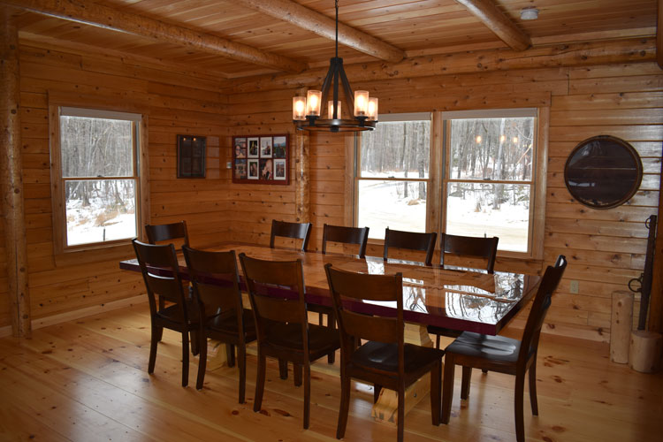 Log Home Dining room with custom table