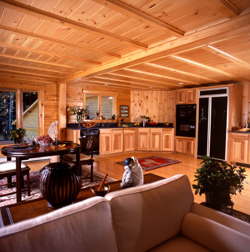 Log home kitchen view from living room