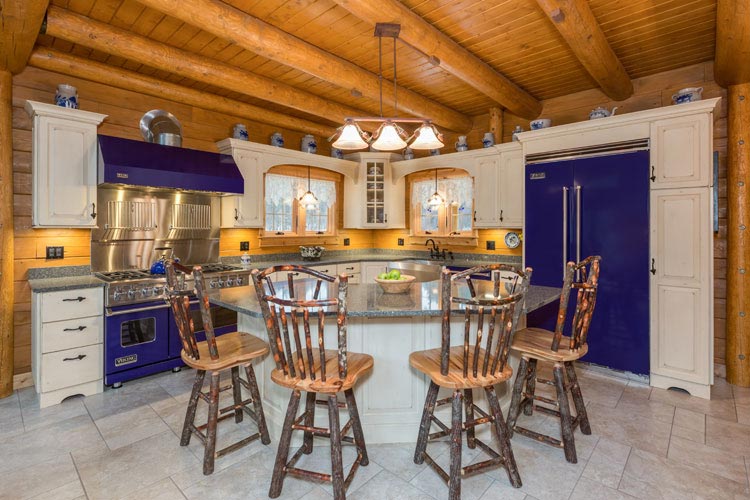 Full view of log home kitchen