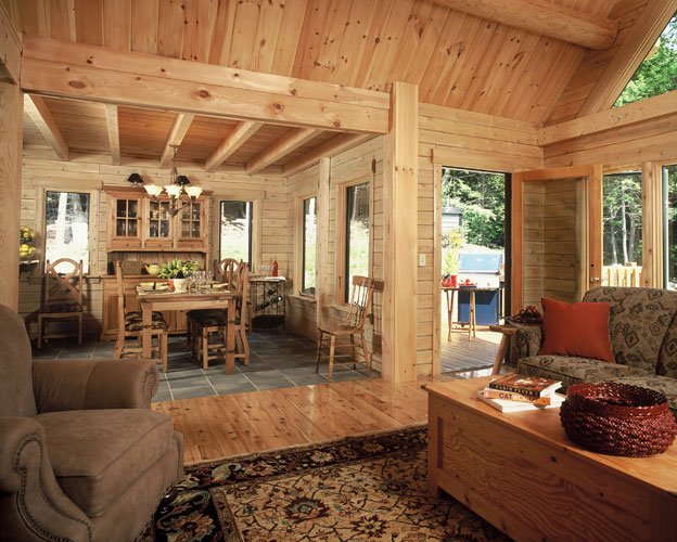 Great Room looking into dining area with exposed beams