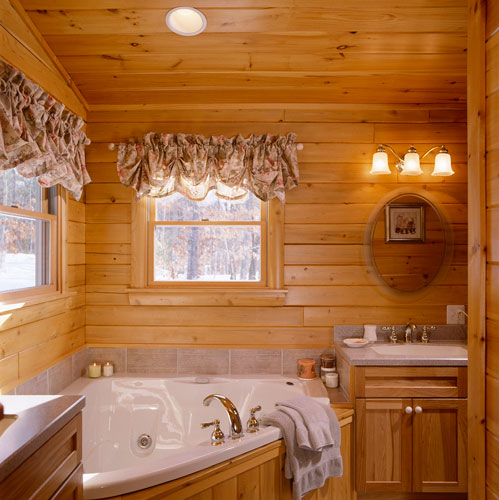 Large soaking tub in Ward Log Home Bathroom