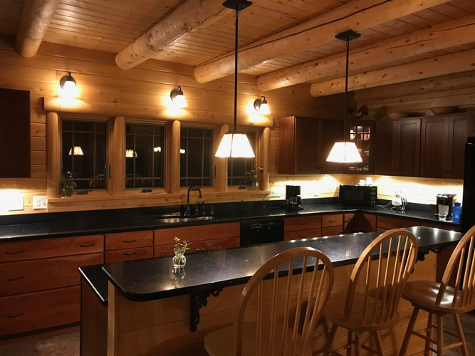 Madison Log Home Kitchen at night