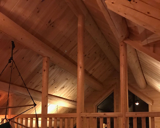Madison Log Home showing cathedral ceiling