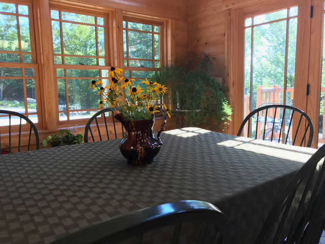 Dining table in Madison Log Home