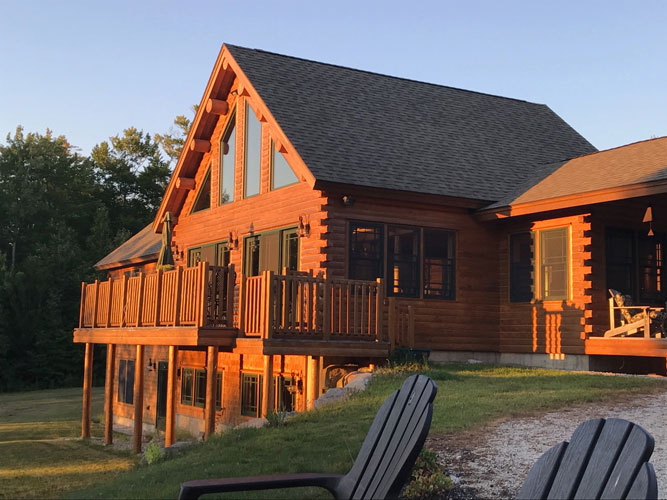 Madison Log Home during sunset