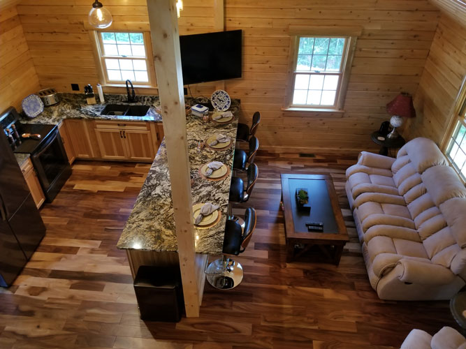 Looking down from loft in Musquash log cabin