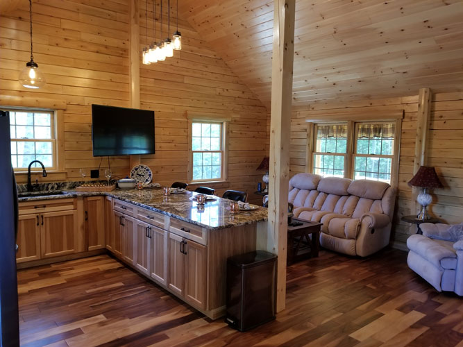 Open interior of Musquash log cabin