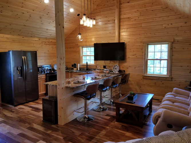 Open are showing kitchen of Musquash log cabin