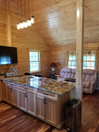 Kitchen with granite countertop of Musquash log cabin