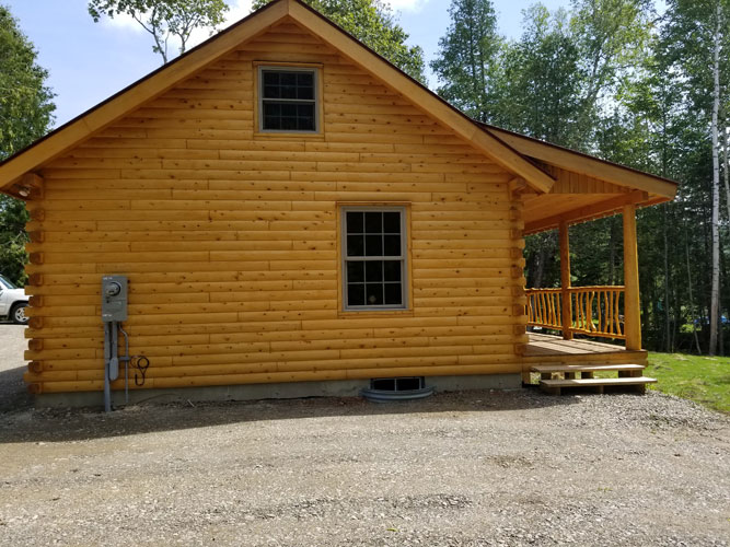 Musquash log cabin side view 