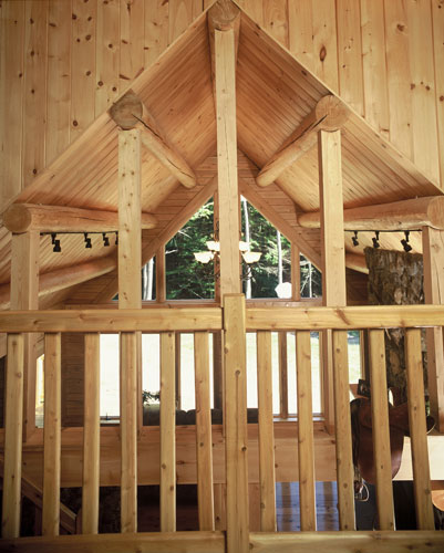 Loft area with cedar rail and purlins