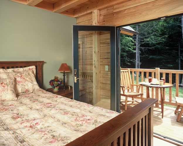 Master bedroom with french doors out to deck