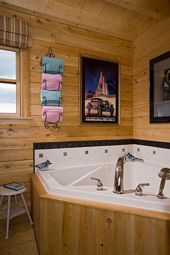 Log home bathroom with large garden tub