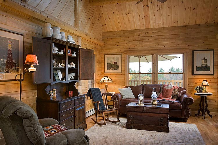 Sitting area in log home with leather couch