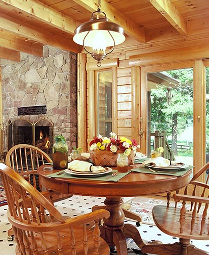 Round dining room table and square beams