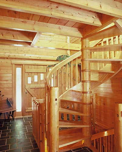 Spiral stairs leading up to loft