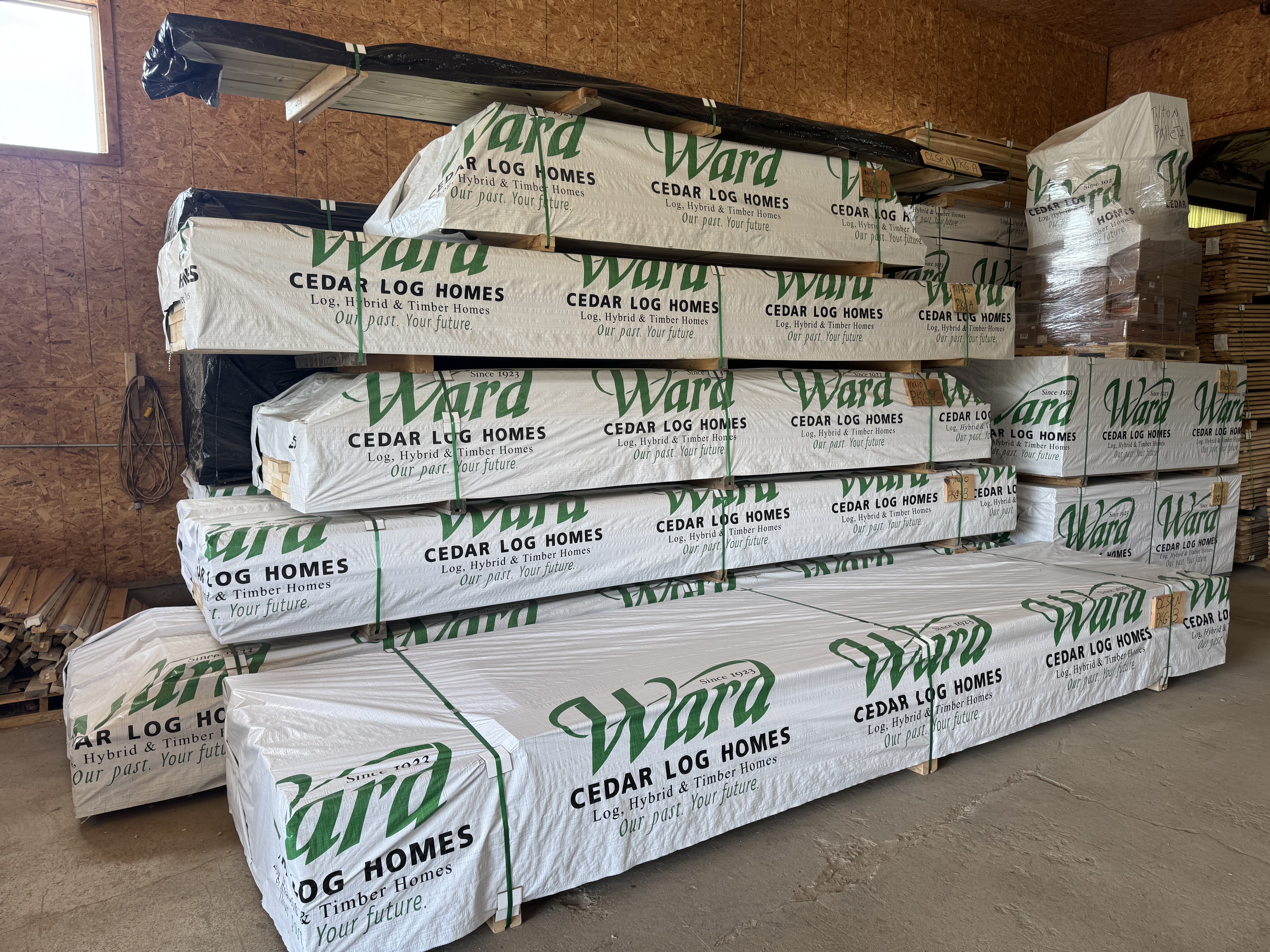 Log home materials wrapped and ready to be shipped out